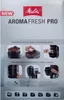 The image shows the packaging of a Melitta AromaFresh Pro coffee maker. It features multiple small images illustrating the product's features and benefits, along with text descriptions. Náhľad obrázku produktu