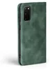 A green flip cover case for a Samsung Galaxy S20 phone, shown from the side with the camera cutout visible. Produktbild-Vorschau