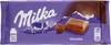 A Milka Noisette chocolate bar wrapper with a depiction of mountains, a cow, and a piece of chocolate. Produktbild-Vorschau