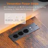 A flush-mount power strip with outlets and USB ports is installed on a wooden surface. Anteprima dell’immagine prodotto
