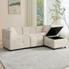 A beige sectional sofa with an open storage ottoman in a living room setting. Voir les images du produit