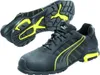 A pair of black and yellow Puma safety shoes are shown against a white background. One shoe is shown from the side, and the other is shown from the sole. Voir les images du produit