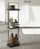 A bathroom shelf unit with various toiletries next to a bathtub. Podgląd zdjęcia produktu