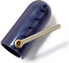 A close-up studio shot of a blue knitting thimble with a silver metal lever, isolated on a white background. Podgląd zdjęcia produktu
