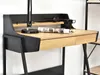 A close-up view of a minimalist desk with a black frame and a light wood surface. Náhľad obrázku produktu