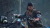 A man on a motorcycle in a forest setting. Produktbild-Vorschau