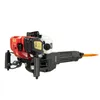A red and black demolition hammer with an orange chisel, shown against a white background. Náhled obrázku produktu