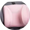 Close-up of a pink headrest on a gray car seat. Produktbild-Vorschau