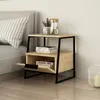 A modern nightstand next to a bed. Produktbild-Vorschau