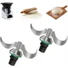 A collage of kitchen appliances and ingredients, including a food processor, rolling pin with flour, dough on a cutting board, and two mixing blades. Produktbild-Vorschau