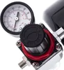 Close-up of an air pressure gauge and regulator. Podgląd zdjęcia produktu