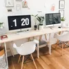 A modern home office setup with two desks, computers, and chairs. Anteprima dell’immagine prodotto