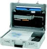 An open aluminum attaché case with various documents and a mobile phone inside. Anteprima dell’immagine prodotto