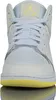 A front view of a pair of white and yellow Nike Air Jordan 1 Mid sneakers. Podgląd zdjęcia produktu