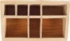 A top-down view of an empty bamboo organizer with seven compartments. Náhled obrázku produktu