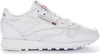 A white Reebok sneaker is shown from the side against a white background. Voir les images du produit