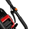 A close-up view of the handle and controls of a red and black power tool, likely a lawnmower or similar equipment. Anteprima dell’immagine prodotto