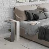 A modern bedroom scene with a bedside table next to a bed. Produktbild-Vorschau