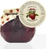 A jar of strawberry jam with its label and lid cover. Voir les images du produit