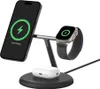 A black wireless charging stand with a phone, smartwatch, and earbuds on it. Produktbild-Vorschau