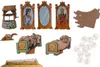 A collection of miniature diorama pieces, likely for a play or display, including a well, mirrors, beds with figures, and a glass coffin. Produktbild-Vorschau