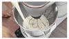 A close-up shot of a Bosch stand mixer with milk being poured into the mixing bowl. Anteprima dell’immagine prodotto