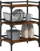 A three-tier kitchen shelf unit with various kitchen items on it. Náhľad obrázku produktu