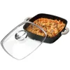 A square cooking pot filled with rice and meat, with its glass lid placed next to it. Náhled obrázku produktu