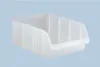 A white plastic storage bin is shown against a light blue background. Anteprima dell’immagine prodotto