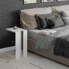 A modern bedroom scene with a bedside table next to a bed. Anteprima dell’immagine prodotto