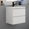 A white bathroom vanity with two drawers is mounted on a gray tiled wall. Produktbild-Vorschau