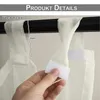 A hand is shown attaching a beige, sheer curtain to a curtain rod using velcro. A measurement graphic is also visible. Produktbild-Vorschau