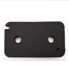 A black foam filter with two circular holes and a small notch on the top left. Anteprima dell’immagine prodotto