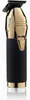 A professional studio shot of a gold and black hair trimmer against a white background. Voir les images du produit