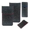 Four grey felt sleeves with pink stitching are arranged on a white background. Produktbild-Vorschau