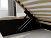 A close-up view of the underside of a bed frame, showing the lifting mechanism and wooden slats. Produktbild-Vorschau