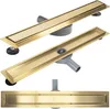 Three views of a gold linear shower drain with a gray drain body. Náhled obrázku produktu