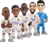 Five cartoon-style figurines of Real Madrid football players in their team kits, standing side-by-side. Produktbild-Vorschau