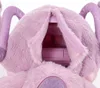 A close-up view of the opening of a plush toy, revealing a pink plastic compartment inside. Náhľad obrázku produktu