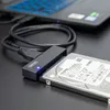 A hard drive connected to a laptop via a UNITEK adapter. Náhľad obrázku produktu