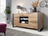 A modern sideboard in a living room setting, with a plant and lamp. Náhled obrázku produktu