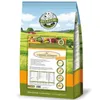 A bag of dog food with a scenic background of fields and a house. Produktbild-Vorschau