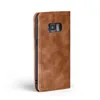A brown flip cover case for a smartphone is shown against a white background. Produktbild-Vorschau
