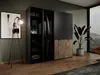 A modern bedroom with a large wardrobe, a floor lamp, and a potted plant. Produktbild-Vorschau