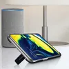 A smartphone case with a built-in stand is displayed on a table next to a smart speaker and a lamp. Anteprima dell’immagine prodotto