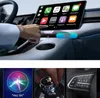 A collage showing a car's interior with a touchscreen display, a close-up of a rotary dial, and a steering wheel control panel. Produktbild-Vorschau
