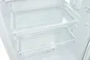 The interior of a white refrigerator with two shelves and a drawer. Produktbild-Vorschau