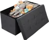 A dark gray storage ottoman filled with teddy bears and a pillow. Produktbild-Vorschau