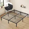A black metal bed frame is shown in a bedroom setting with a window and a shelf on the wall. Produktbild-Vorschau