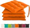 A stack of four orange seat cushions is shown, with a row of seat cushions in various colors displayed below. Produktbild-Vorschau